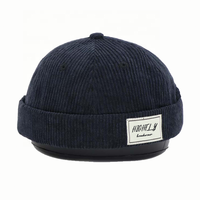 Gorra de béisbol con logotipo de etiqueta tejida sin ala, sombrero Docker de algodón de pana negra, gorras Sin borde personalizables, sombreros para hombres