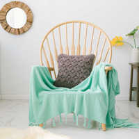 Nouvelle arrivée : Couverture en coton tricoté moderne avec pompons pour canapé et hôtel, idéale printemps-automne, pour un intérieur douillet