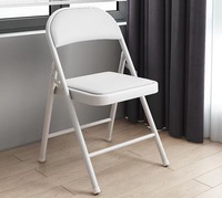 Chaise pliante commerciale Moon Black avec siège rembourré, structure en acier, capacité de 330 lb, facile à transporter, design moderne pour mariage