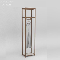 Présentoir de magasin de vêtements en or pour boutique de détail