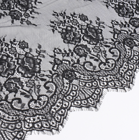Dentelle de cils de luxe 100 % nylon cordonnée avec motif floral ajouré et bord festonné pour la conception élégante de robes de mariée
