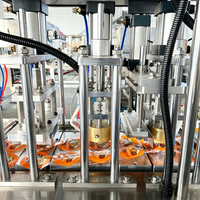 Machine de scellage automatique de couvercles de gobelets à nouilles sur mesure OEM pour le remplissage et le scellage de gobelets/bols en plastique, papier et aluminium dans les usines alimentaires
