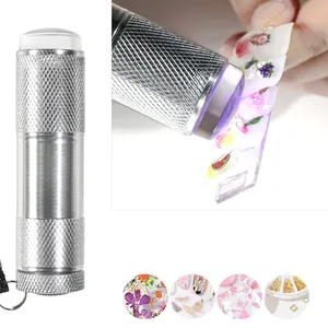 Vendita calda Mini luci a LED torcia lampada UV nuova maschera portatile per Gel per unghie asciugatura rapida strumento per Manicure essiccatore per unghie