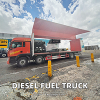 Véhicule de transport de carburant diesel HOWO pour transport spécial de marchandises dangereuses, boîte à vitesses manuelle, caisse à ailes battantes
