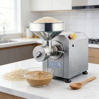 Petite machine automatique pour broyer les noix et fabriquer de la pâte d'amande et de la pâte d'arachide, machine à collation