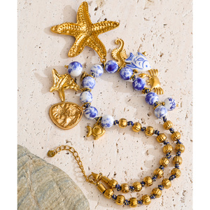 JINYOU 7438 <span class=keywords><strong>Collana</strong></span> Girocollo in Acciaio Inossidabile Placcato Oro a Tema Oceano con Perline in Ceramica Blu e Bianche e Ciondolo a <span class=keywords><strong>Stella</strong></span> <span class=keywords><strong>Marina</strong></span> Smaltata - Product Image 5