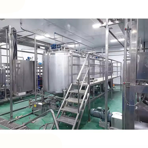 Ligne de production de machines de remplissage et de bouchage rotatives entièrement automatiques pour bouteilles en PET de lait pasteurisé, capacité 10 000 BPH, personnalisable - Product Image 3