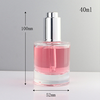 Flacon compte-gouttes en verre de 40 ml à épaule plate et fond épais avec pompe à pression