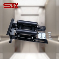 Dispositif de guidage à rouleaux pour chaîne de compensation d'ascenseur, stabilisateur anti-oscillation en caoutchouc, guide de chaîne compensatrice pour ascenseur à structure ouverte