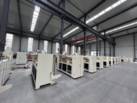Machine à coudre semi-automatique à double pièce pour la fabrication de cartons