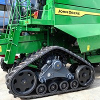 Système de conversion à chenilles triangulaires en caoutchouc Juexin, fourni directement par l'usine, pour moissonneuses-batteuses et tracteurs agricoles
