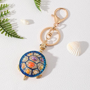 พวงกุญแจใส่เหรียญแฟชั่น ของที่ระลึกสำหรับผู้หญิง ดีไซน์สร้างสรรค์ รูปสัตว์ทะเลเต่า ประดับคริสตัลโอปอลและเพชรเทียม - Product Image 6