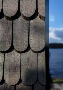 Cabane en <span class=keywords><strong>bois</strong></span> noir de style moderne avec toit en pente et fenêtre cintrée, idéale pour une retraite solitaire au bord d'un lac forestier, surface de base de 80 m², maison facile à construire - Product Image 2