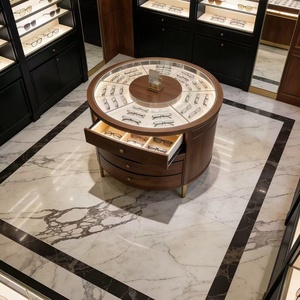 Ensemble d'agencements de magasin d'optique de luxe personnalisable avec éclairage LED en verre trempé, design durable - Meubles muraux ronds pour îlot central - Product Image 5