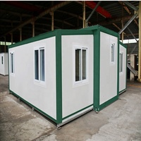 Maison conteneur préfabriquée extensible de luxe avec 2 chambres aux normes australiennes avec panneau sandwich pliable en acier pour cuisine