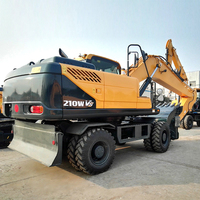 Excavatrice sur pneus fiable de 210 WS pour la construction urbaine, l'entretien routier, l'installation de canalisations, l'aménagement paysager et la manutention de matériaux