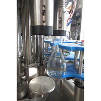 Machine automatique de lavage, remplissage et bouchage de bouteilles en verre certifiée CE pour thé aux herbes et lait, 500-2000 ml, 500-1200 BPH, facile à utiliser