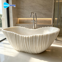 Baignoire ovale autoportante en marbre massif, sculptée à la main, moderne et élégante, durable, pour une utilisation en salle de bain intérieure