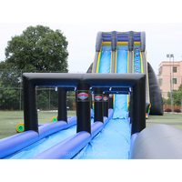 Toboggan aquatique gonflable géant bleu pour adultes de 10 m de haut avec double voie pour les fêtes d'été à la plage et à la piscine