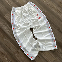 Celana Jogger Track kasual kustom celana berkancing pria katun robek longgar lurus kaki Streetwear celana olahraga uniseks
