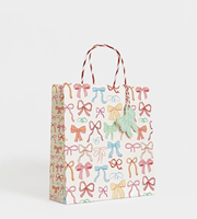 Sacs en papier kraft marron classiques personnalisés avec poignées en corde, finition mate et gaufrée, pour emballage cadeau et promotion en magasin de détail