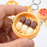Chaveiro Portátil Criativo de PVC com Miniaturas de Comida Falsa: Pães Cozidos a Vapor, Bolinhos e Mantou - Mais Vendido