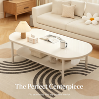 Table basse ovale blanc crème avec étagère de rangement à 2 niveaux, table centrale double couche de style français moderne pour la décoration du salon