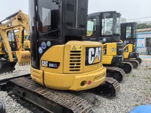 Mini-pelles CAT 304 d'occasion, 4 tonnes, excavatrice sur chenilles, machinerie hydraulique avec accessoire tarière, certifiée EPA CE - Product Image 2