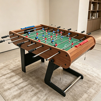 Table de baby-foot S.Q.F 8 Rod MDF de taille standard avec tiges chromées, pieds stables et design de ballon de football sur le plateau
