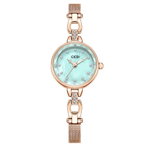 นาฬิกาควอตซ์สำหรับสตรีหน้าปัดมุกหรูหราอ่อนออกแบบสร้อยข้อมือระดับไฮเอนด์สำหรับเทศกาลคริสต์มาส - Product Image 4