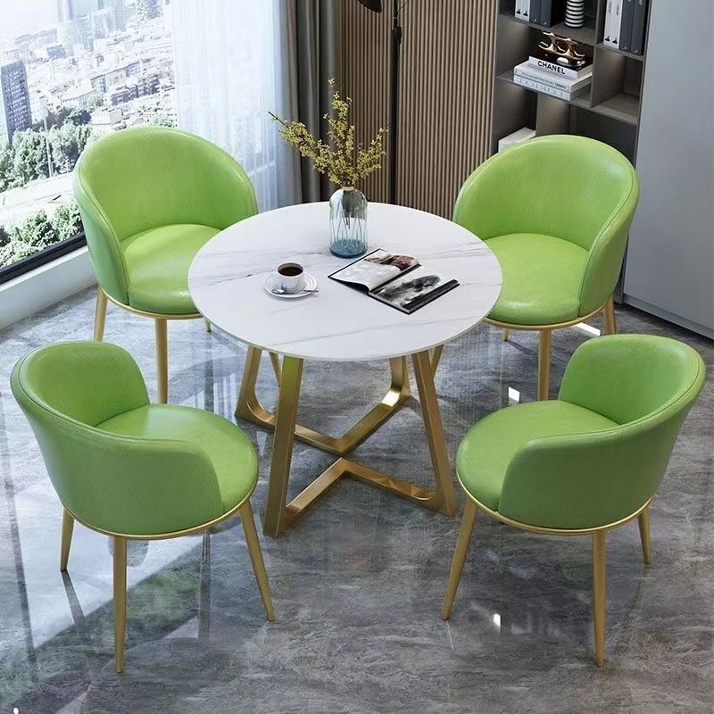1 table pieds dorés+4 chaises cuir vert