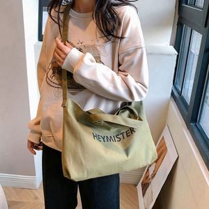 กระเป๋าผ้าแคนวาสสะพายข้างแบบขายส่ง กระเป๋าสะพายขนาดใหญ่ กระเป๋าผ้าแคนวาสแบบสั่งทำพร้อมโลโก้ - Product Image 3