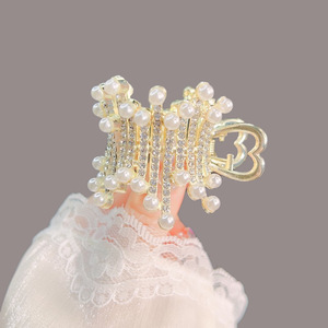 2023 Nueva joyería para el cabello, conjunto de perlas, pinza de cola de caballo alta de diamante, pinza de pelo de Pony mágica fija anticolapso - Product Image 1