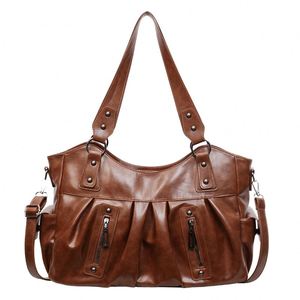 Bolsos de Mano Personalizados de Fábrica al por Mayor, Nuevos Bolsos de Mano para Mujer 2025, Estilo Moderno, Bolsos de Hombro de Cuero Genuino para Mujer - Product Image 1