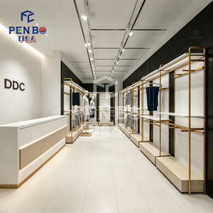 Aménagement intérieur de boutique de vêtements pour hommes au design moderne et haut de gamme, présentoirs à vêtements autoportants dorés sur mesure pour magasin de détail - Product Image 6