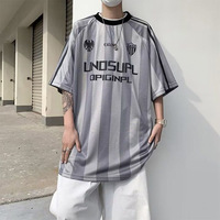 Maillot de football rose style unique OEM ODM pour homme, été 2026, coupe ample, respirant, en maille 180g, à séchage rapide, avec lettres, manches courtes