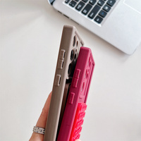 Coque de téléphone tendance 2-en-1 en silicone avec support à ventouse et finition mate pour iPhone 18 17 Pro Max 16 15 14 13, avec poignée selfie et fonction anti-stress