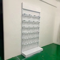 Idées de décoration murale pour le magasin Mingtang, design simple, étagère en métal sur pied, présentoir à chaussures commercial pour magasin de chaussures de sport