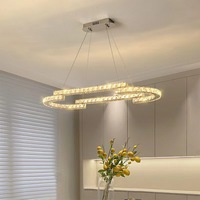 Lustre moderne en cristal K9, lampe suspendue en acier doré de luxe avec forme ovale à économie d'énergie pour la décoration du salon
