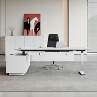 Chef de bureau intelligent Chef de direction Table électrique réglable en forme de L Bureau assis debout Pieds en acier inoxydable