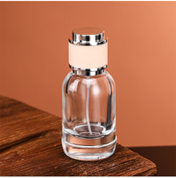 Flacon de parfum vide en verre transparent rond de 30 ml avec bouchon argenté rose, logo personnalisé, vente en gros directe d'usine, OEM ODM, faible MOQ