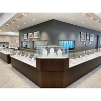 Affichage LED moderne de luxe haut de gamme personnalisé vitrine en verre trempé compteur de bijoux en métal pour les centres commerciaux