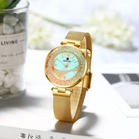 Montre Femme Tendance à Quartz de Luxe Bling-Bling avec Breloque Récompensante