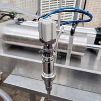 Machine de remplissage semi-automatique d'huile végétale d'argan d'huile de thé eau jus nettoyage miel remplisseur visqueux liquide épais huile moteur
