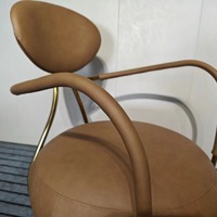 Fauteuil d'appoint ergonomique en cuir de designer haut de gamme avec structure en acier inoxydable doré, chaise longue individuelle moderne pour la maison, le bureau ou la salle à manger