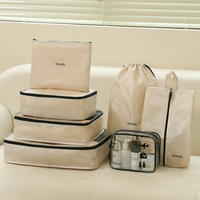 Nouveaux matériaux avec logo personnalisé ensemble de sacs de voyage organisateur de voyage à bon prix cubes d'emballage ensemble de 7 pièces organisateur de voyage bagages beige coloré