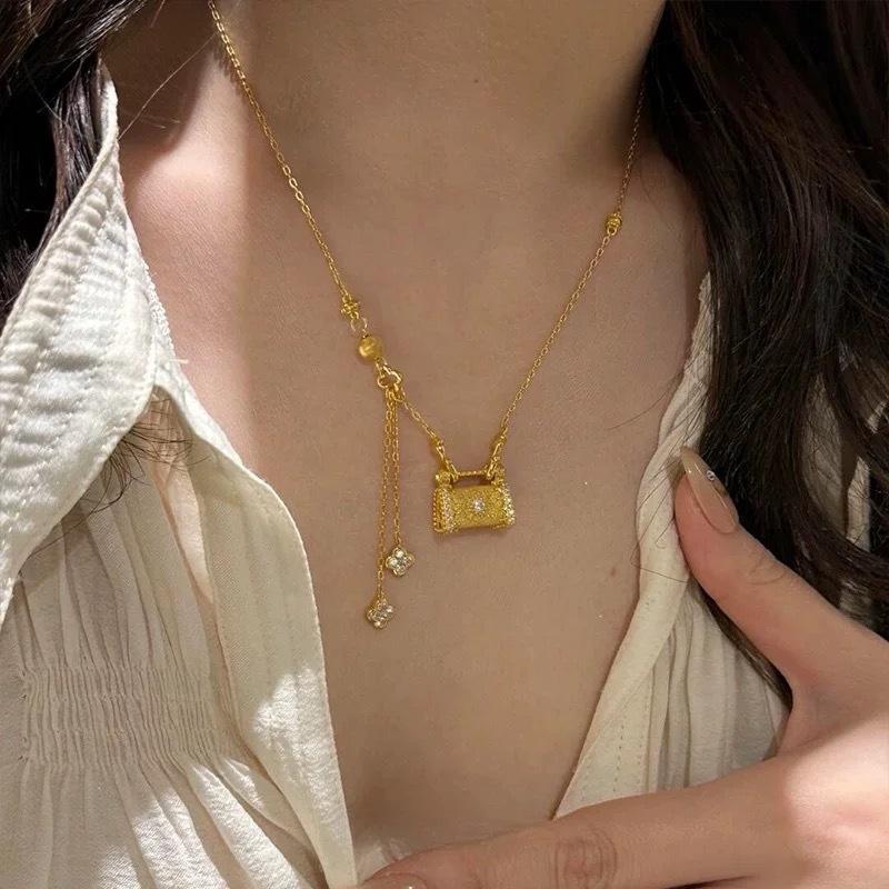 สร้อยคอจี้กระเป๋าล็อคดอกไม้สี่ใบ