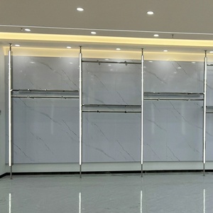 Nuevo Diseño de Exhibidores de Ropa Ajustables de Pared a Techo <span class=keywords><strong>para</strong></span> <span class=keywords><strong>Tiendas</strong></span> de Ropa, con Estantes <span class=keywords><strong>y</strong></span> Luces LED, en Venta - Product Image 1