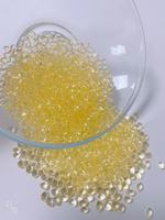 Particules d'adhésif thermofusible transparent jaune pour le collage des bords de meubles en bois, adaptées au collage des bords en PVC épais