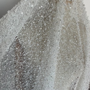 Tissu <span class=keywords><strong>de</strong></span> <span class=keywords><strong>mariée</strong></span> <span class=keywords><strong>David</strong></span> en dentelle perlée blanche délicate à paillettes, très demandé - Product Image 3